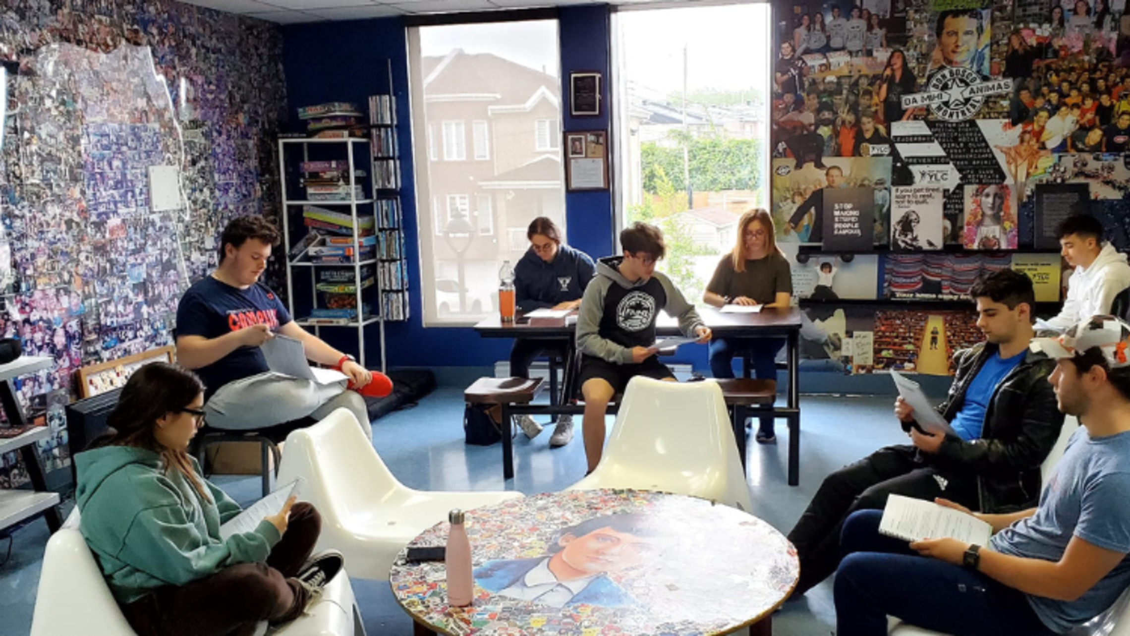 Camp staff reads over handbook before the start of the season | Photo by Fr. Richard Authier, SDB Montreal Summer Camp Training