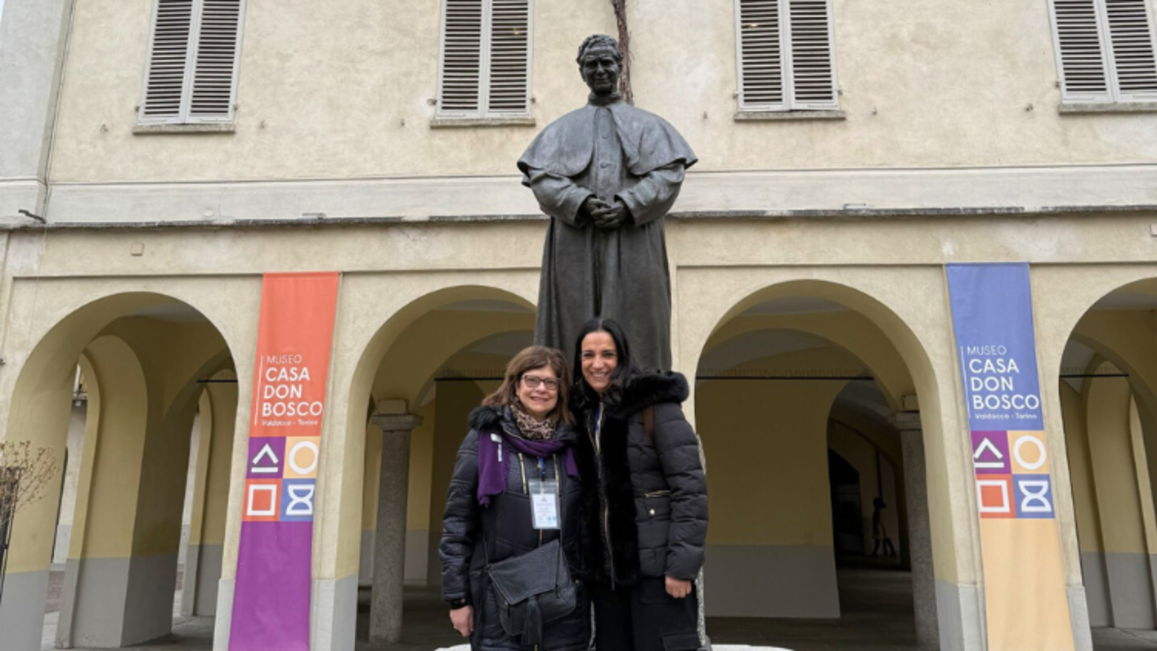Andrea Zimmerman, Salesian Family SDB Delegate, Salesian Cooperator, and Miran Bejjani, Salesian Cooperator, pose in front of the statue of Don Bosco at Valdocco. | Courtesy of Mrs. Andrea Zimmerman, Salesian Family SDB Delegate, Salesian Cooperator Pilgrim Of Hope
