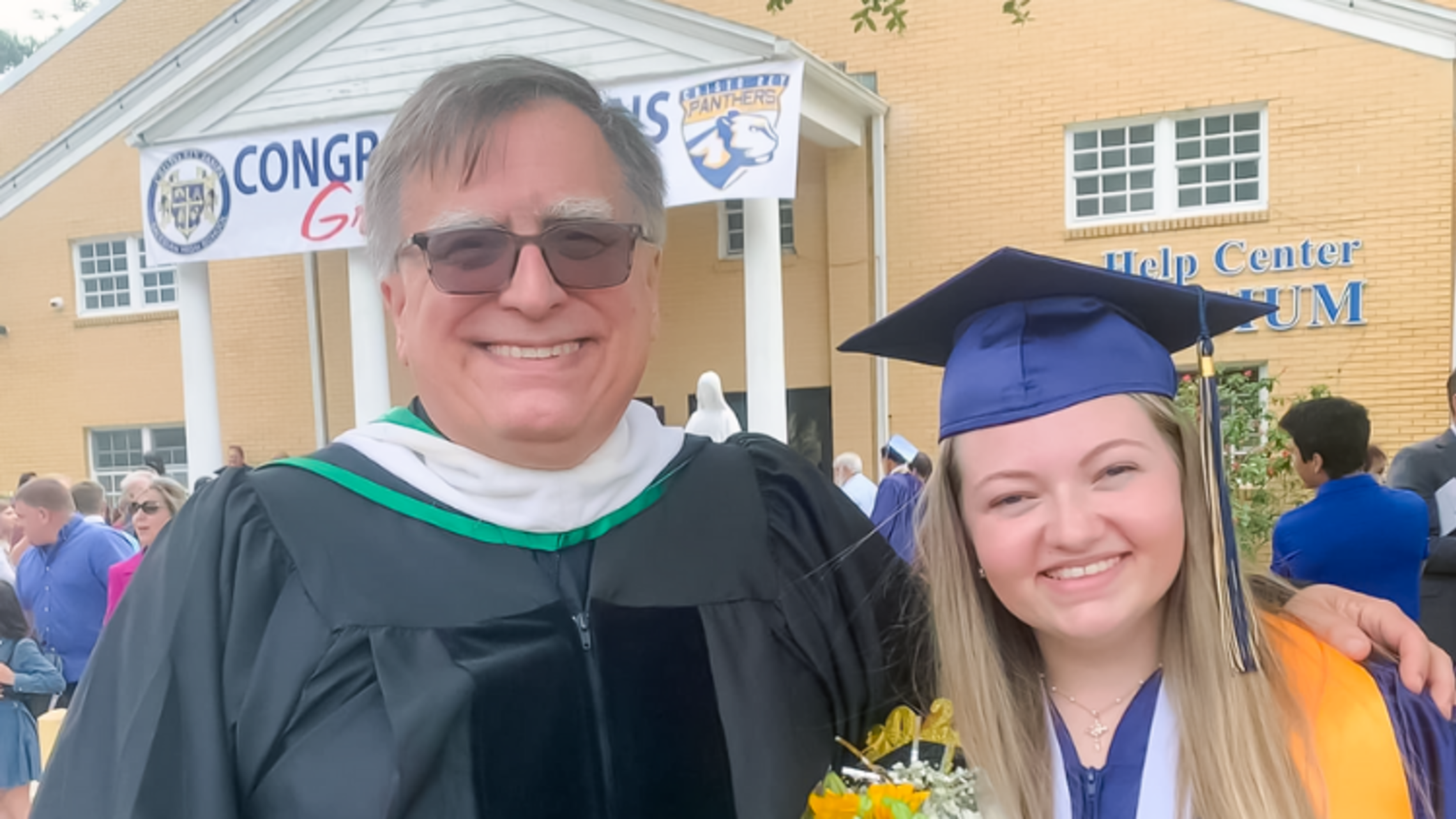 (from left to right) Fr. Louis "Lou" Molinelli, SDB, and Madeline Burns '22 at Cristo Rey Tampa Salesian High School's graduation | Photo by Fr. Lou Molinelli, SDB SYM Corner 06.08.22